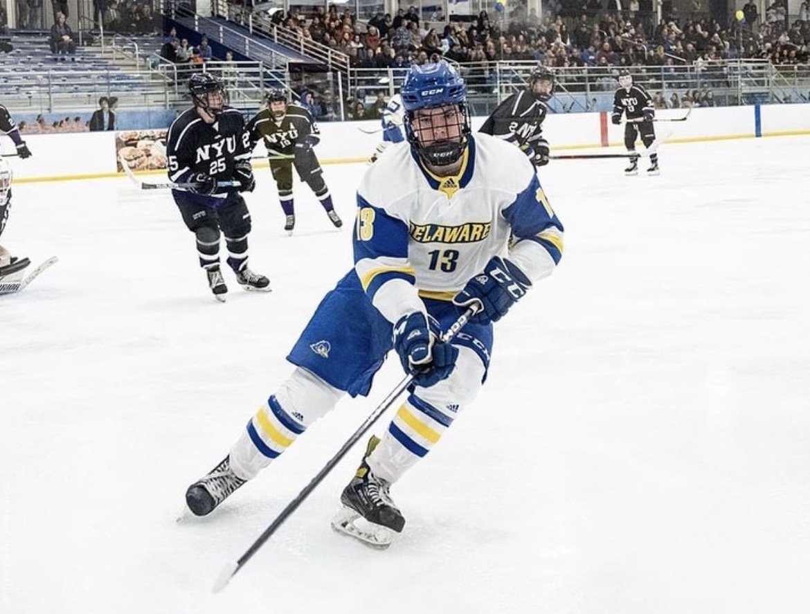 Ethan playing hockey for the University of Delaware