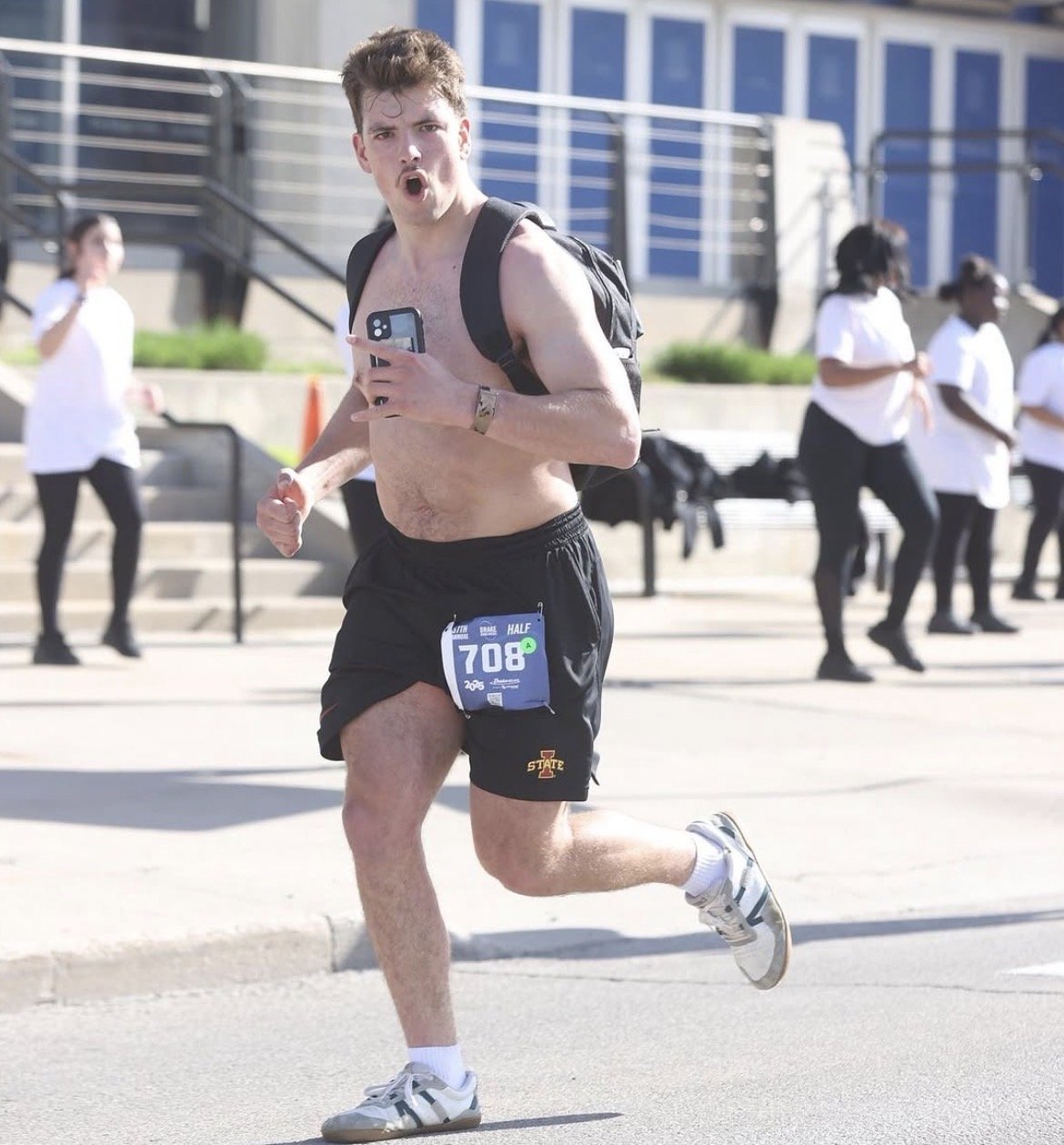 Ethan running the Drake Relays Half Marathon